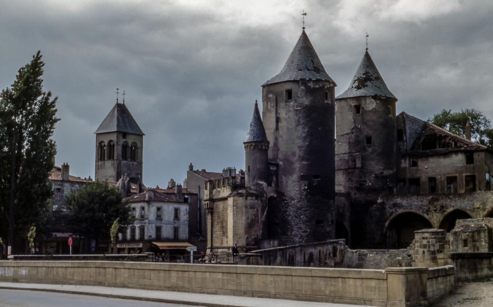 Free Image of Ancient Castle With Towers and Clock Tower 