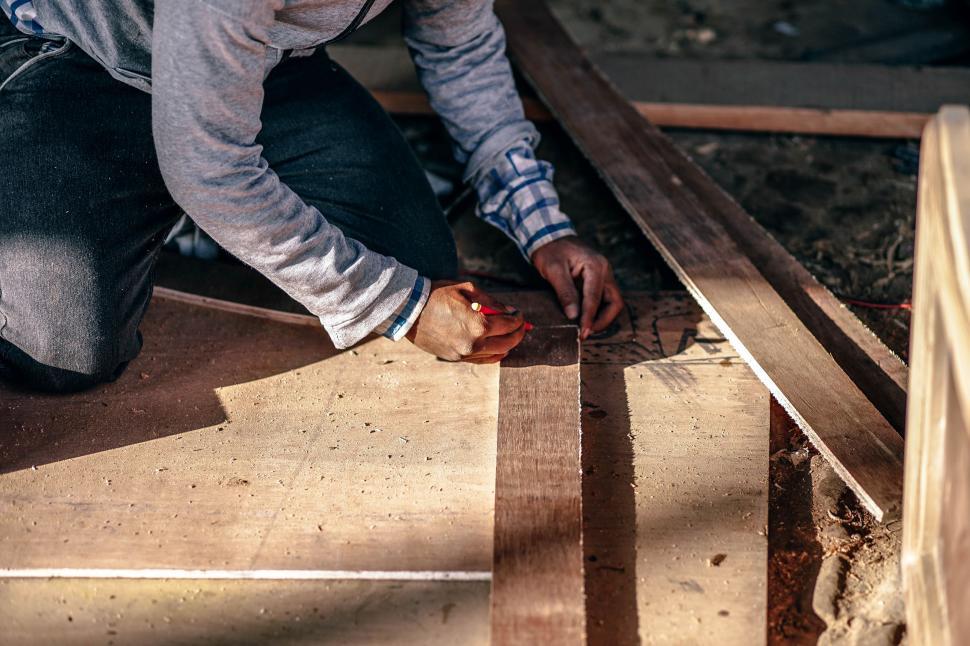 Free Image of Man Carving Woodworking Piece 