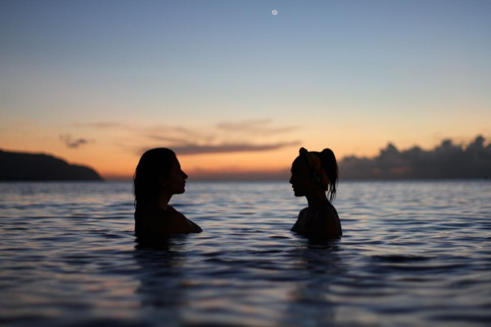 Free Image of People Swimming in the Water 