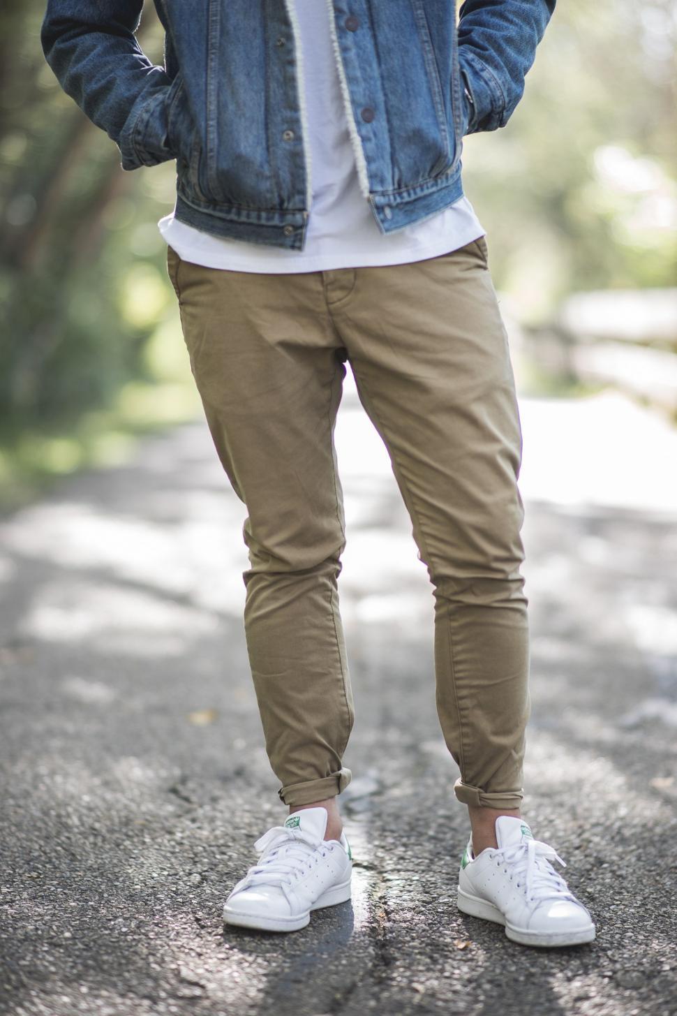 Free Image of Man Standing on Road Wearing Jean Jacket 