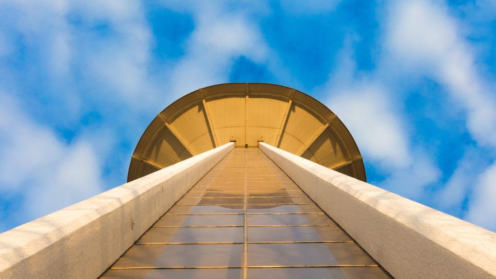 Free Image of Towering Skyscraper Under Blue Sky 