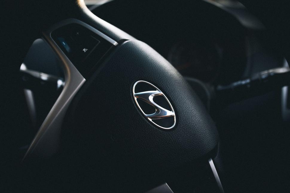 Free Image of Close-Up of a Steering Wheel on a Car 