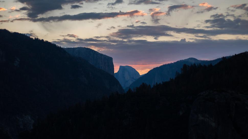 Free Image of Majestic Mountain Range With Clouds 