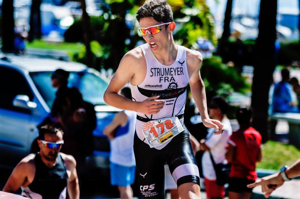 Free Stock Photo Of Man In A Triathlon Suit Running In A Race 