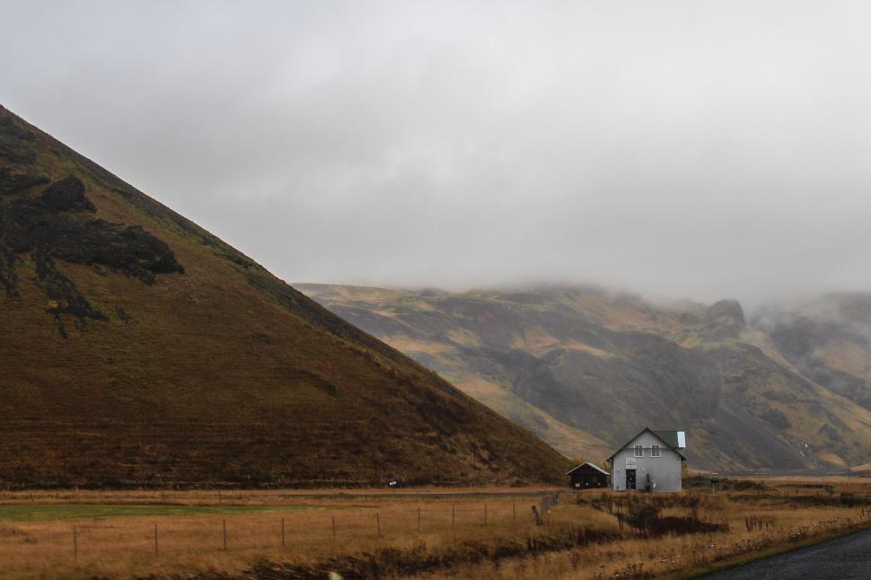 Free Image of House Nestled on Mountain Road 