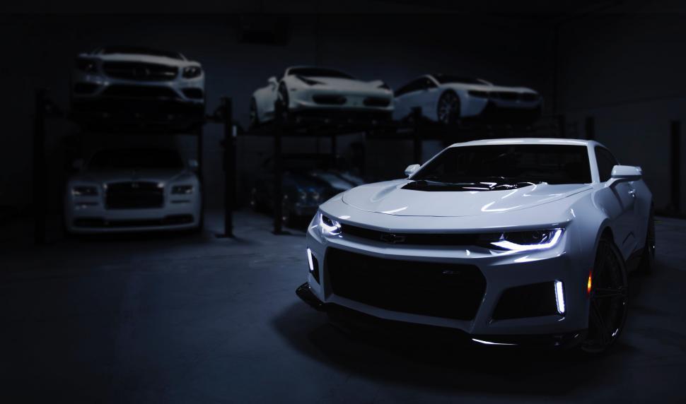 Free Image of White Car Parked in Garage 