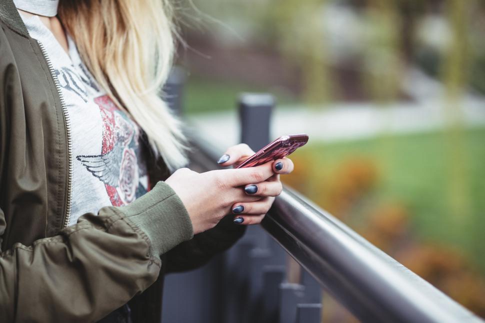 Free Image of Woman Texting on Cell Phone 