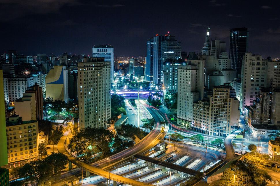 Free Image of Night View of Cityscape From Building Top 