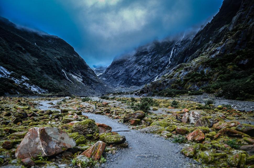 Free Image of River Flowing Through Mountainous Valley 