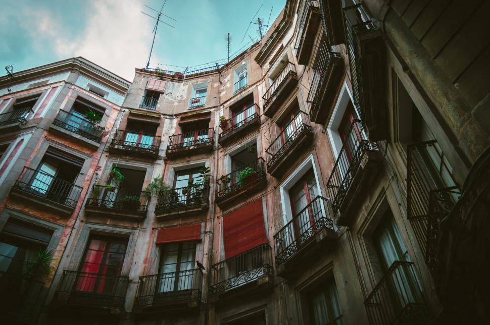 Free Image of Towering Building With Windows and Balconies 