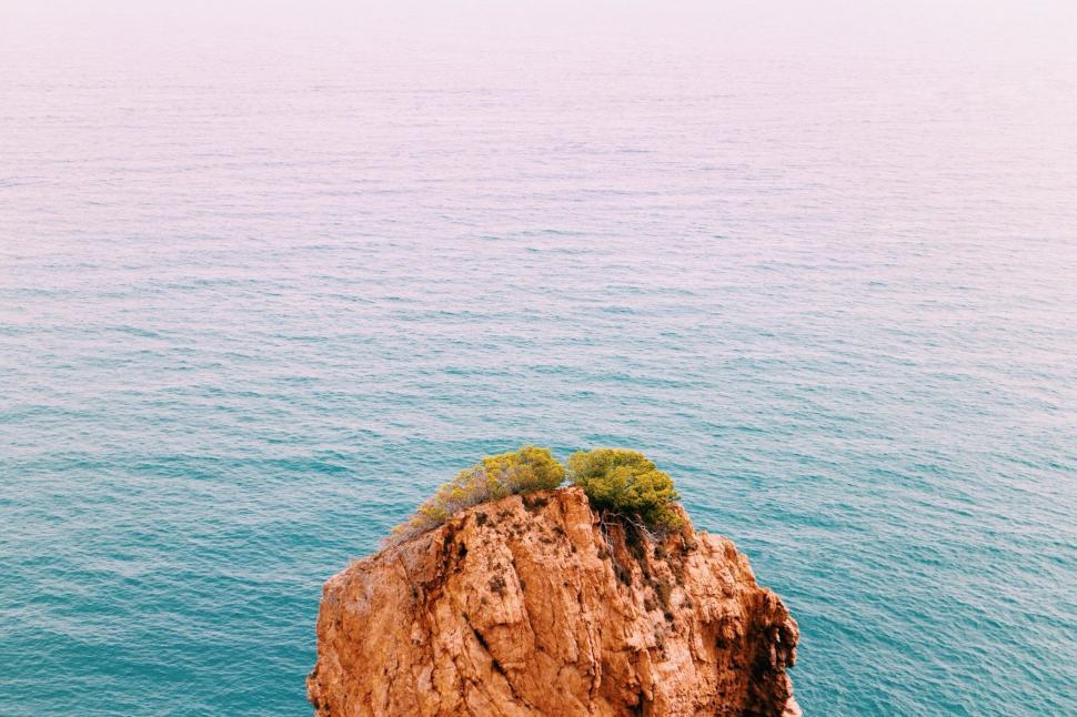Free Image of Small Island in the Middle of the Ocean 