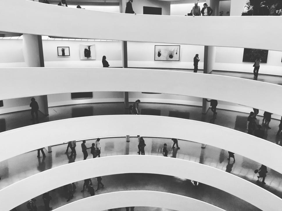 Free Image of Visitors Observing Artifacts in Museum 