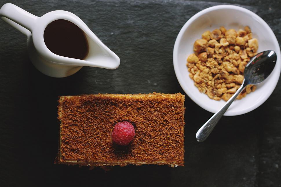 Free Image of A Plate of Food and a Cup of Coffee on a Table 