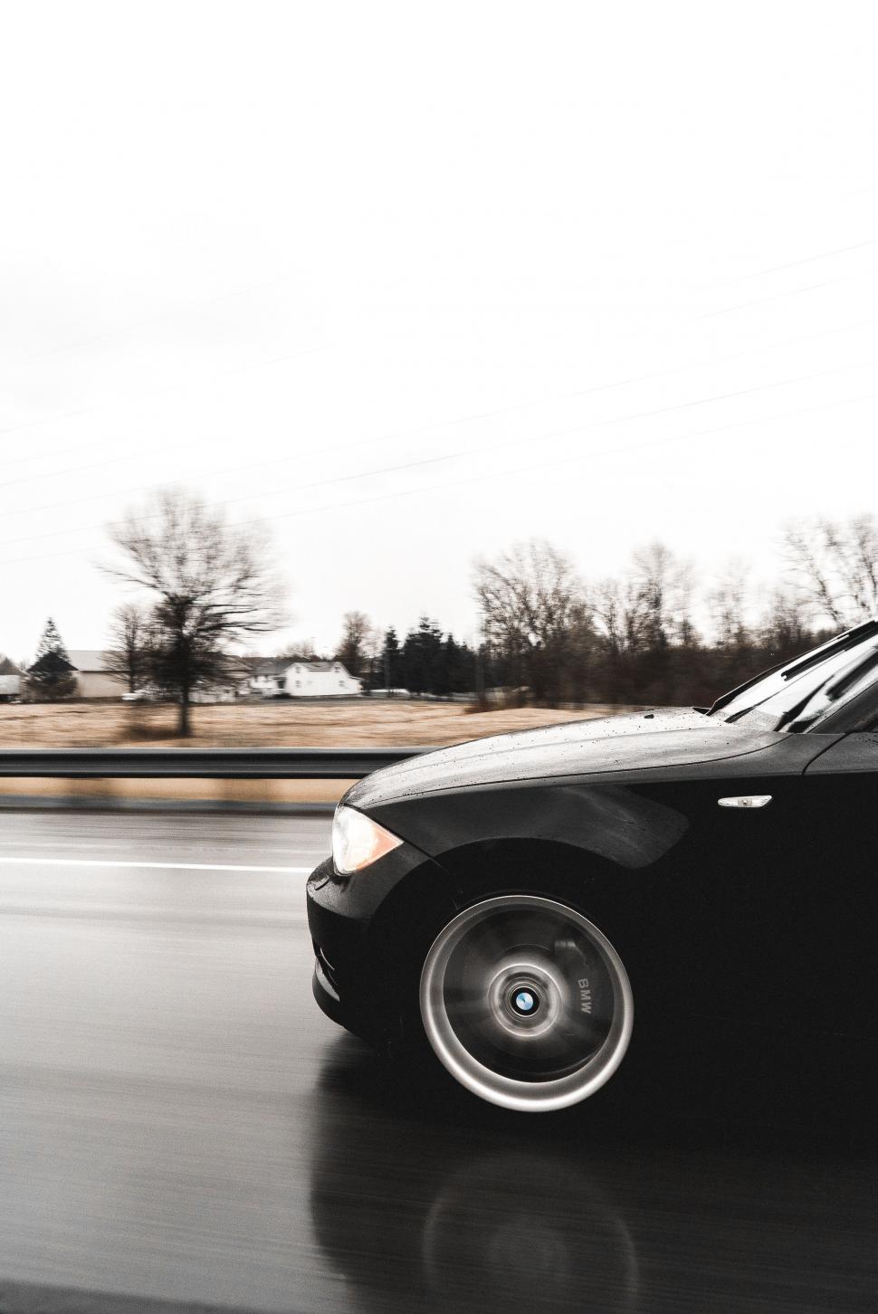 Free Stock Photo of Black Car Driving Down Wet Road | Download Free ...