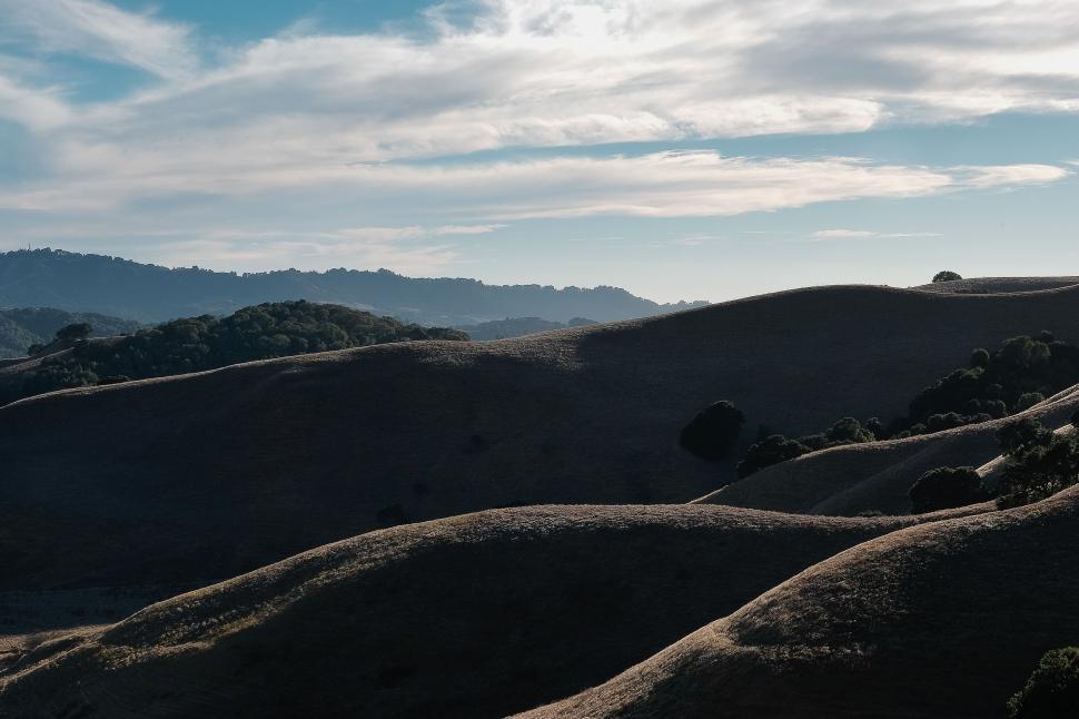 Free Image of Person Riding Skateboard on Top of Hill 