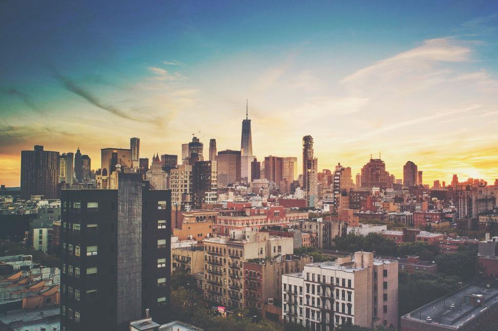 Free Image of City Skyline Glowing at Sunset 