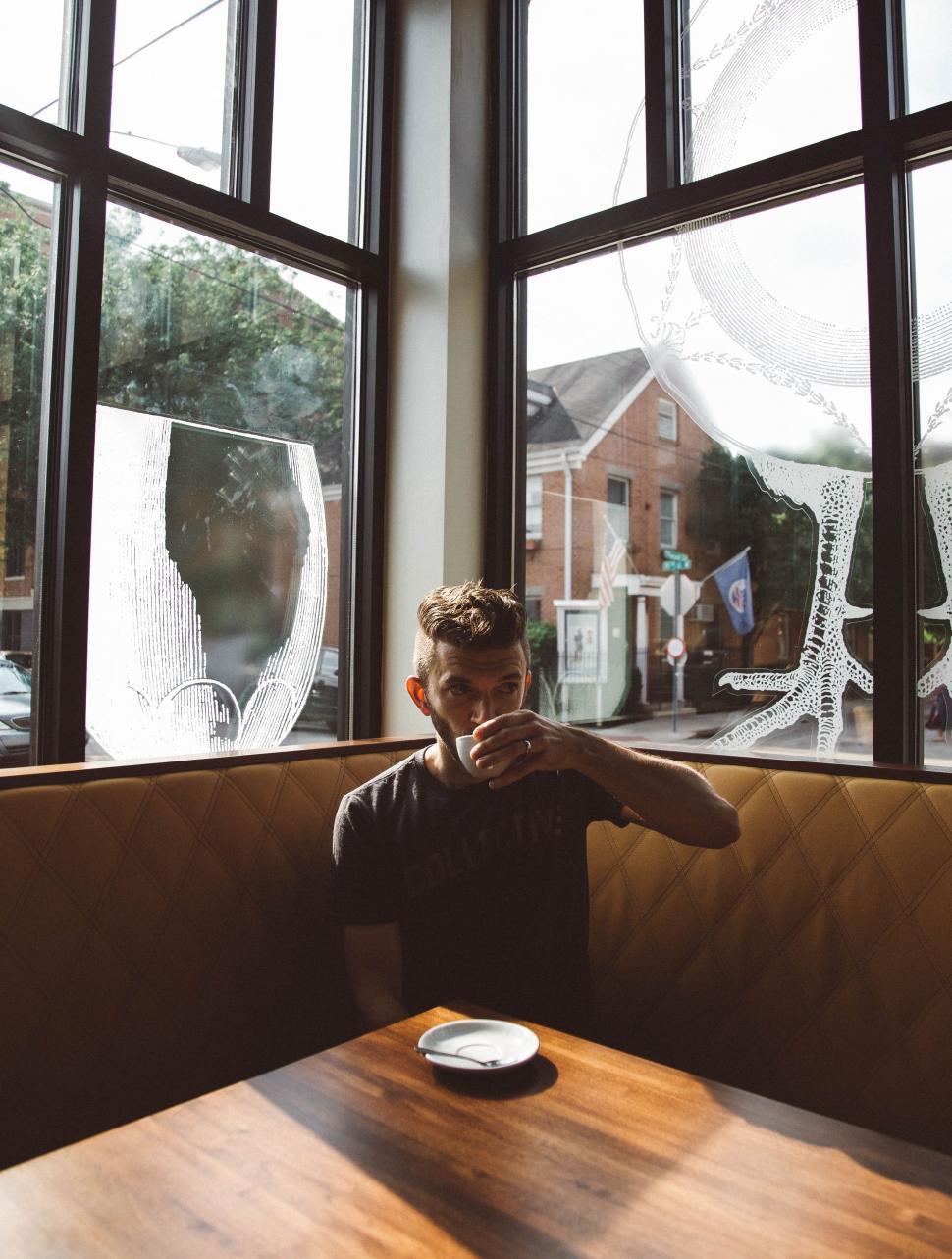 Free Stock Photo of Person Sitting at Table in Front of Window ...