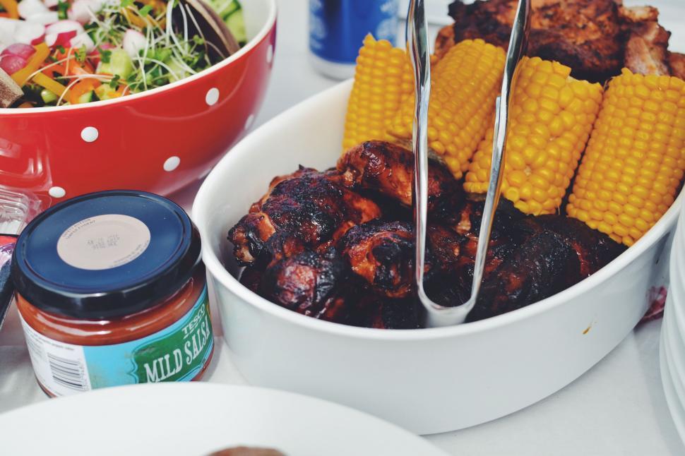 Free Image of White Bowl With Corn on the Cob and Salad Bowl 