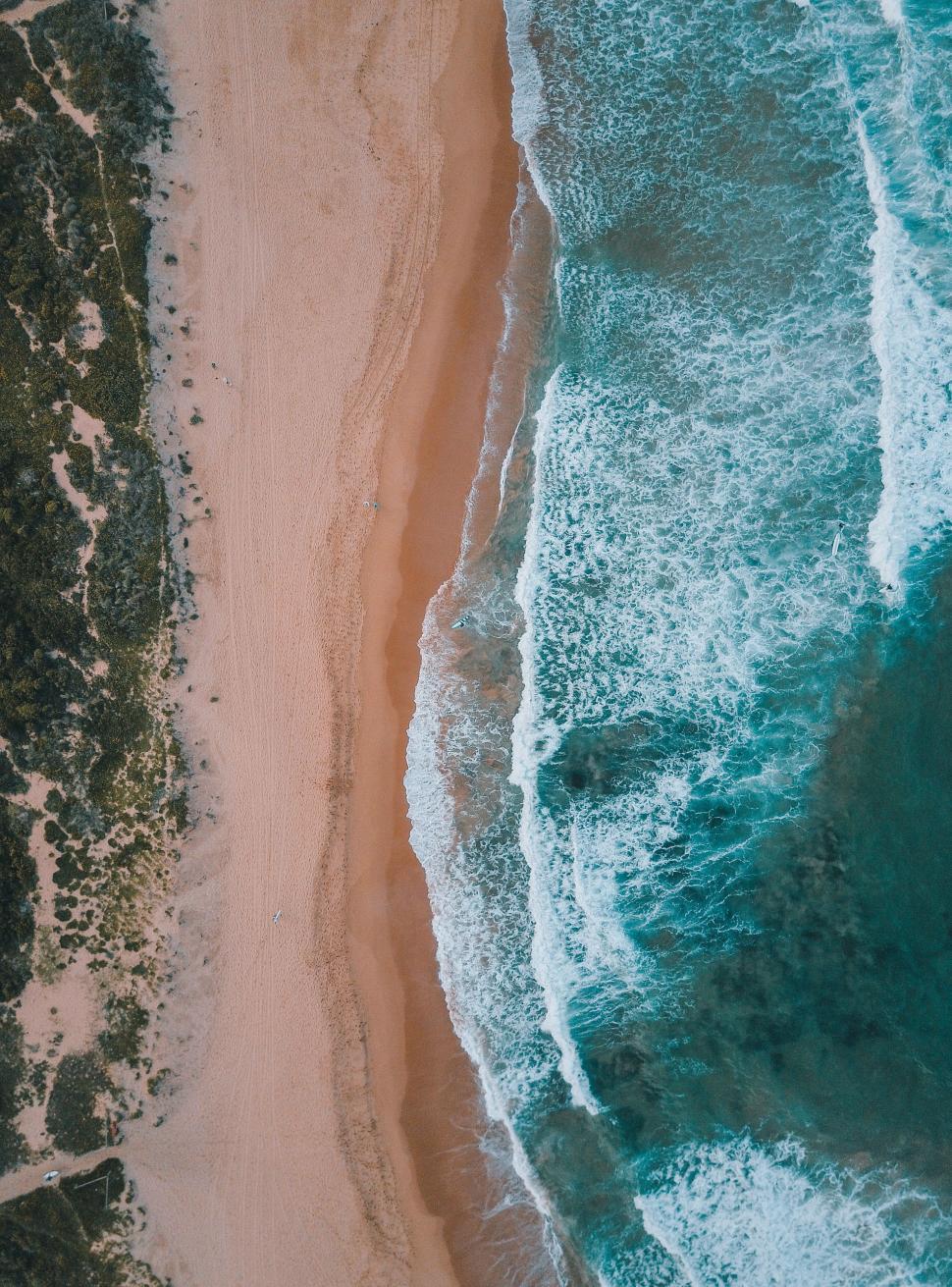 Free Image of Aerial View of Sandy Beach and Ocean 