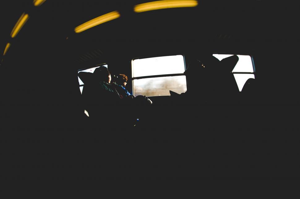 Free Image of Person Sitting in Vehicle With Hands on Steering Wheel 