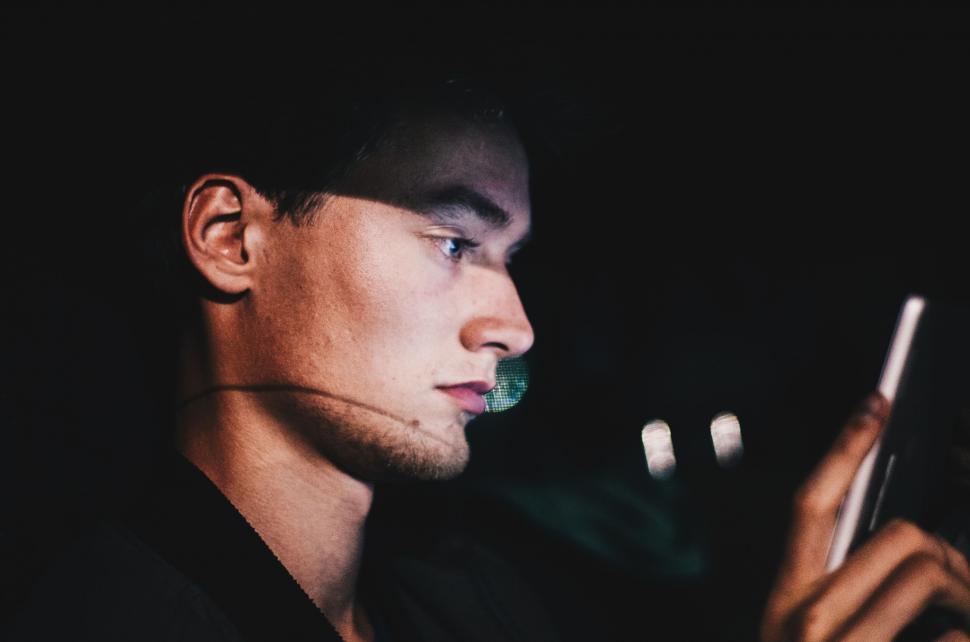 Free Image of Man Holding Cell Phone in Hand 