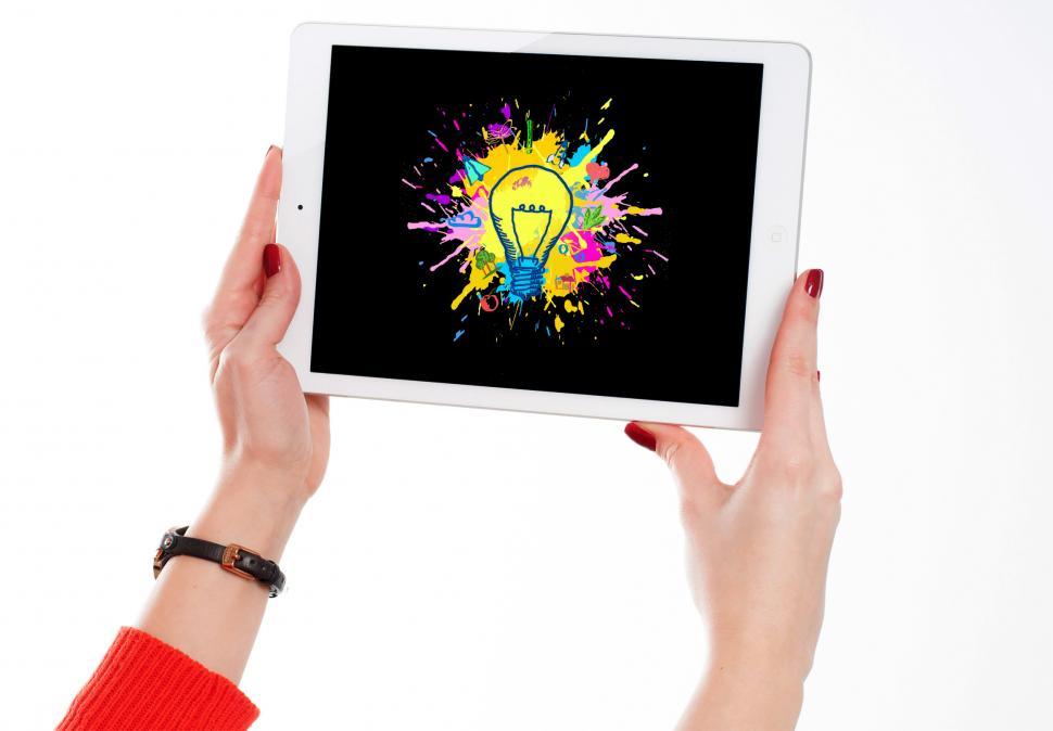 Explosion of Ideas - Person Generating Ideas - Tablet