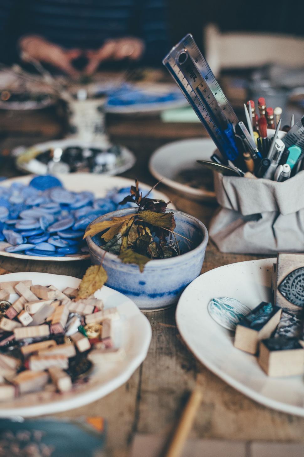 Free Image of Wooden Table Set With Plates and Bowls of Food 