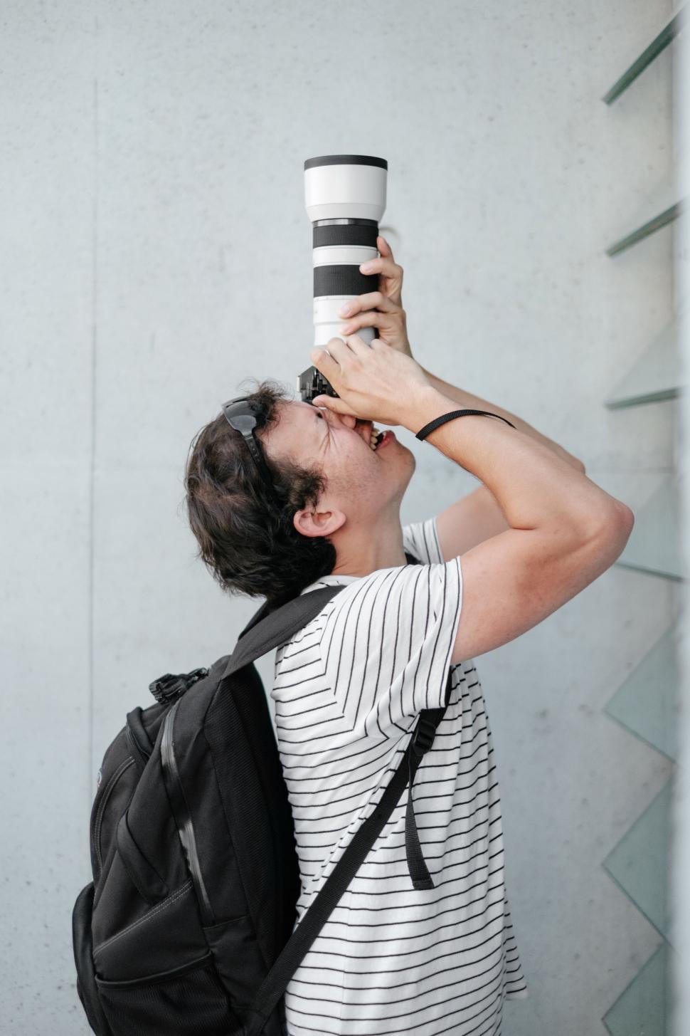 Free Image of Woman Holding a Coffee Cup to Her Face 