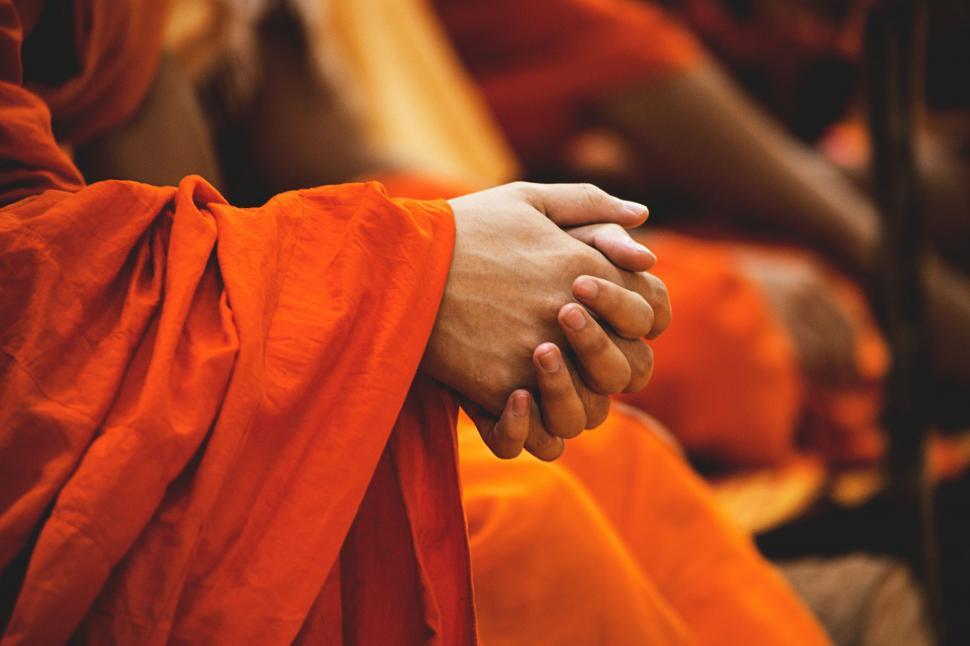Free Image of Couple Holding Hands in Front of Crowd 