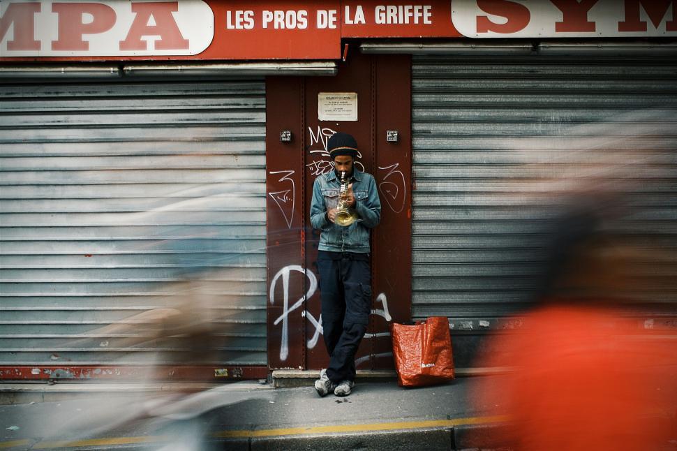 Free Image of Man Standing in Doorway of Building 