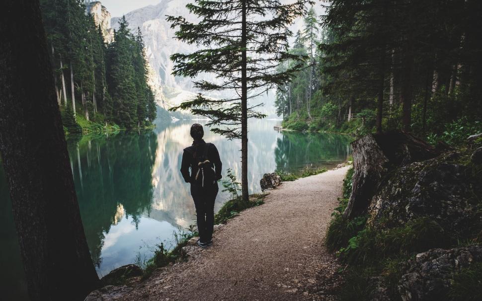 Free Image of Person Standing on Path by Water 