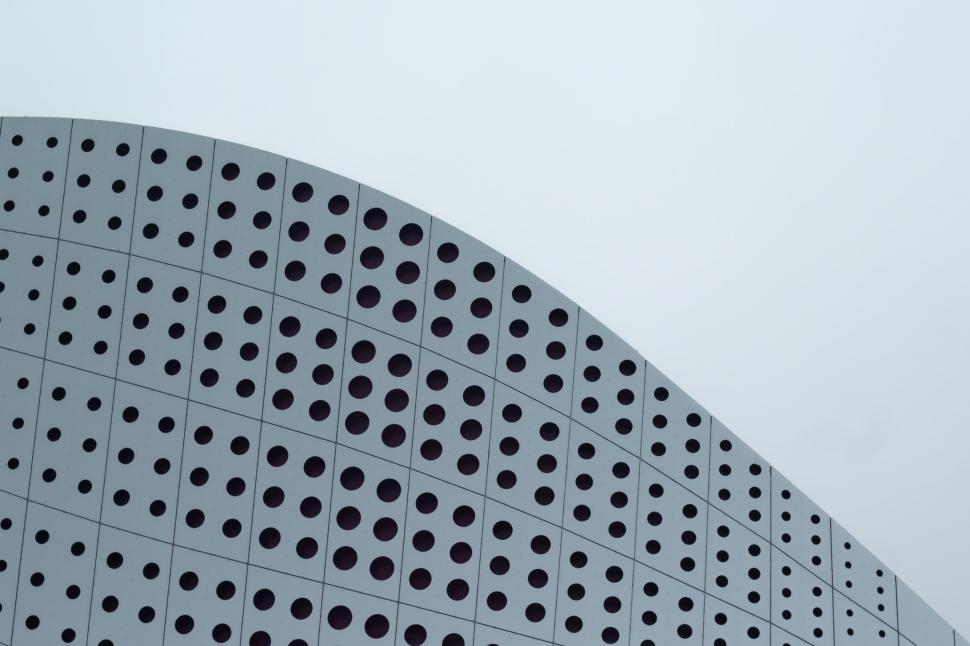 Free Image of Tall Building With Clock on Side 