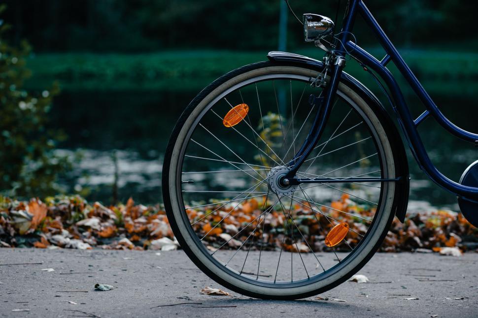 Free Image of Blue Bike Parked on Side of Road 