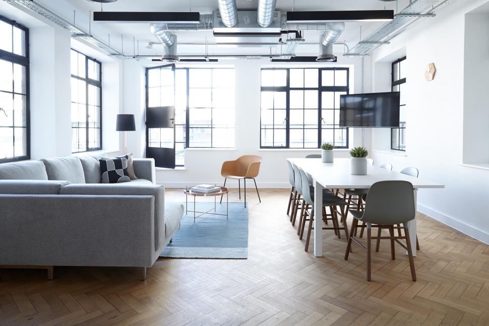 Free Image of Well-Furnished Living Room With Abundant Windows 