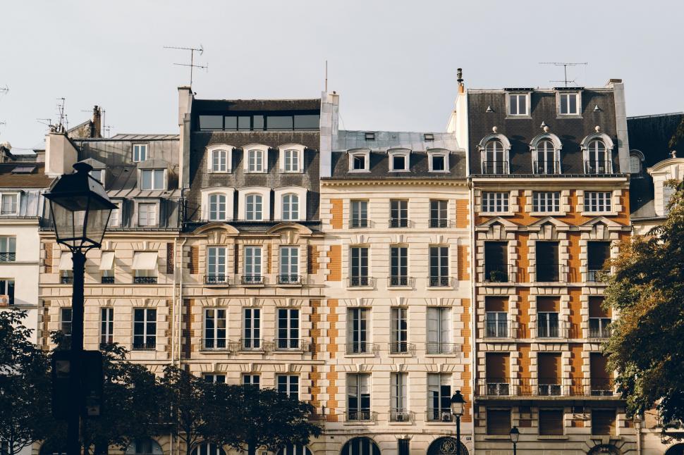 Free Image of Row of Buildings With Street Light 