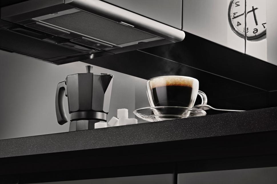 Free Image of Coffee Cup and Clock on Table 