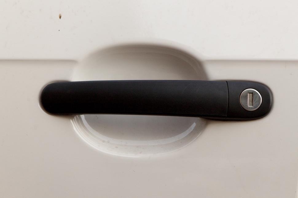 Free Image of Black Handle on White Door Handle 