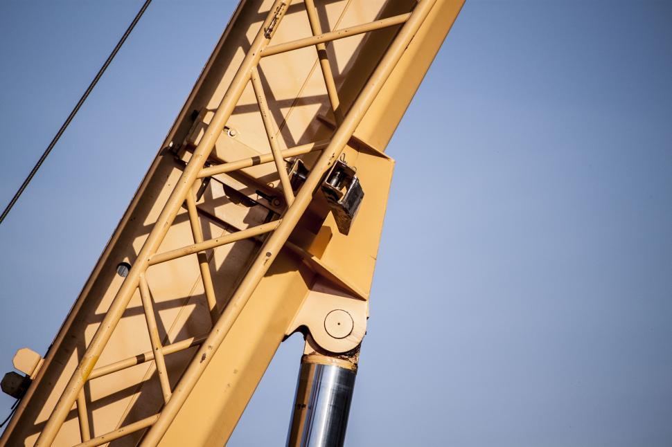 Free Image of Yellow Crane With Blue Sky Background 