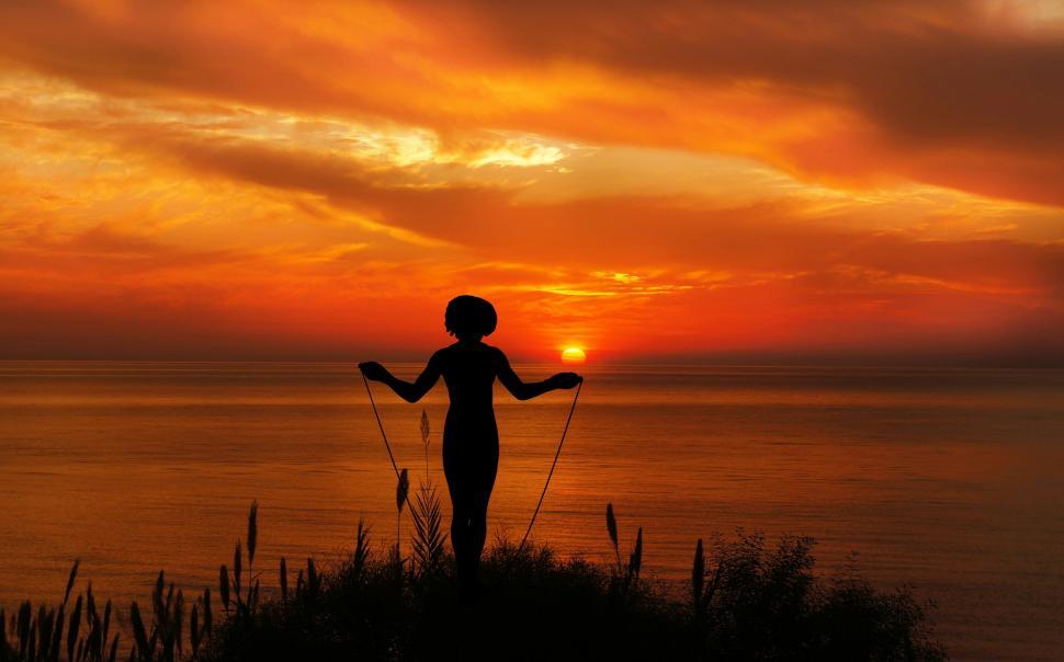 Free Image of woman playing with jumping rope  