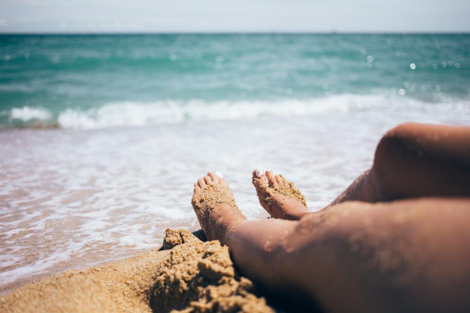 Free Image of Sandy feet on the beach 