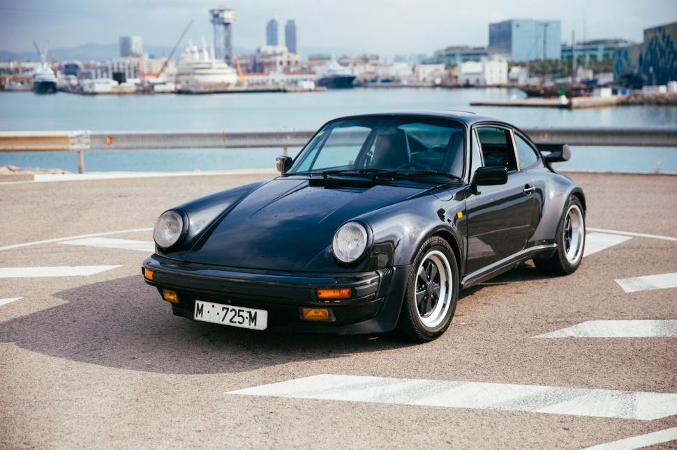 Free Image of Side view of a black sports car 