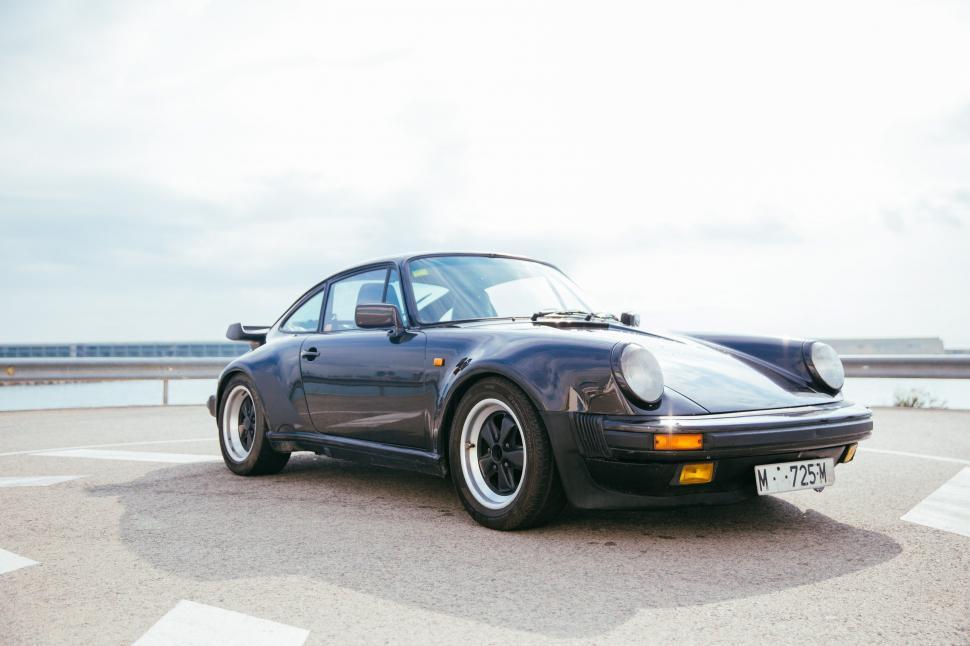 Free Image of Side view of a black sports car 