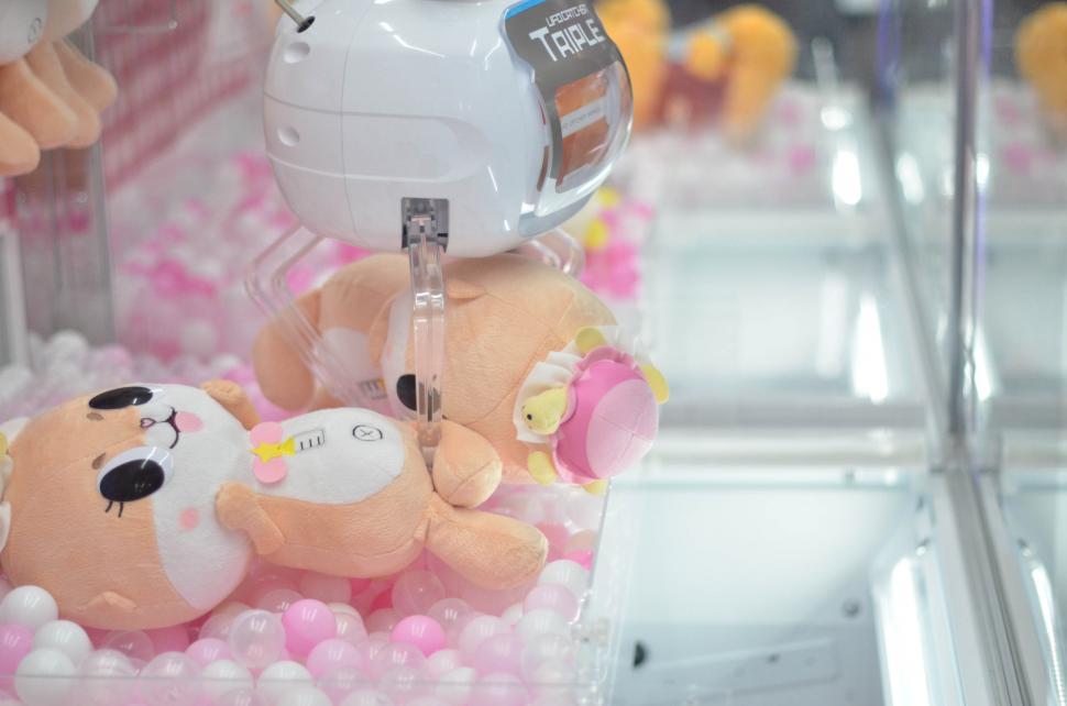 Stuffed Animals in Toy Crane Machine, Tokyo, Japan - Stock Photo