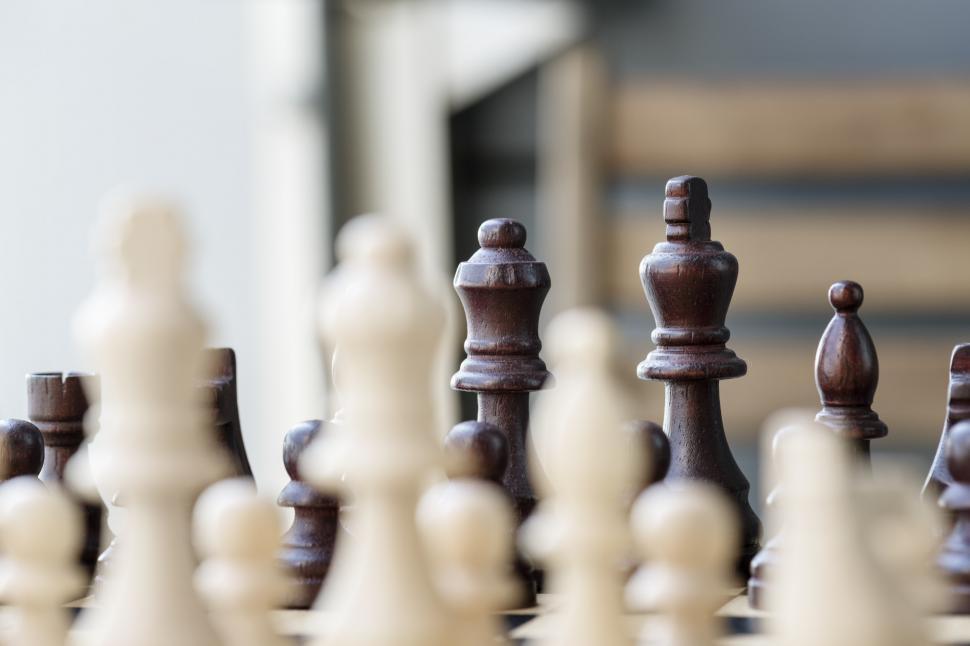 Browse Free HD Images of Chess Pieces In Focus On A Wooden Chess Board