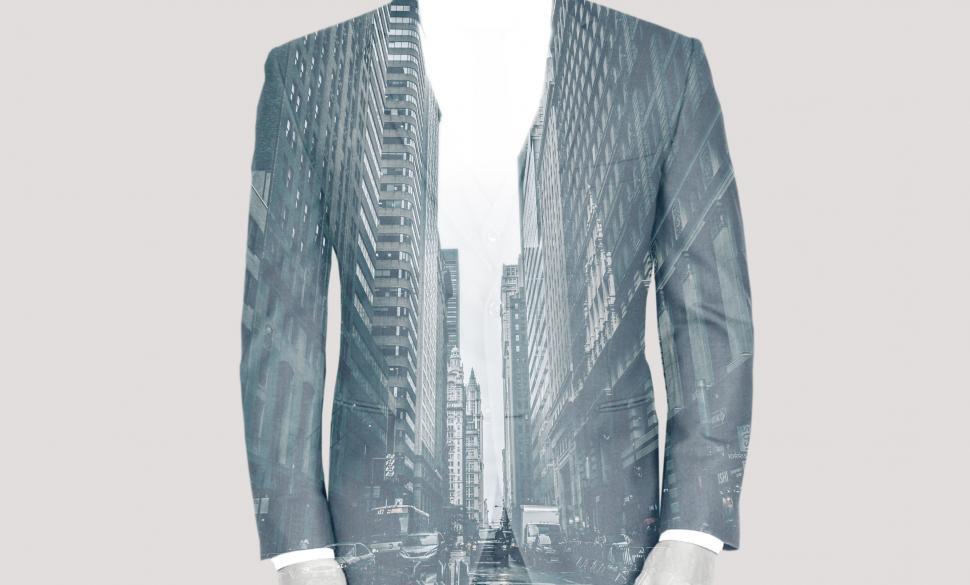double-exposure-of-businessman-over-cityscape--success-and-achi.jpg