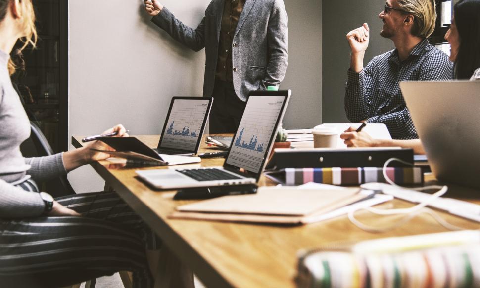 Free Image of Colleagues around a conference table 