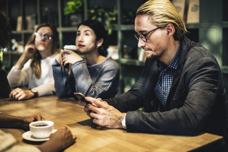 Free Image of Colleagues in a cafe table 