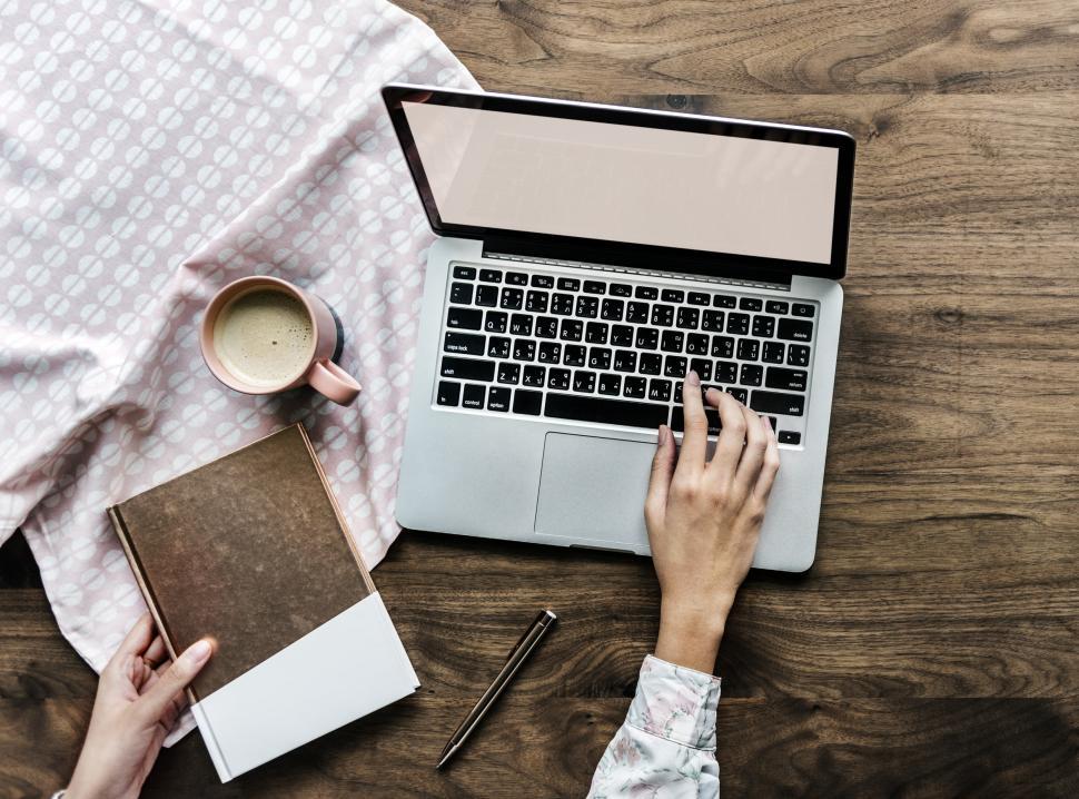 Person Typing On Laptop