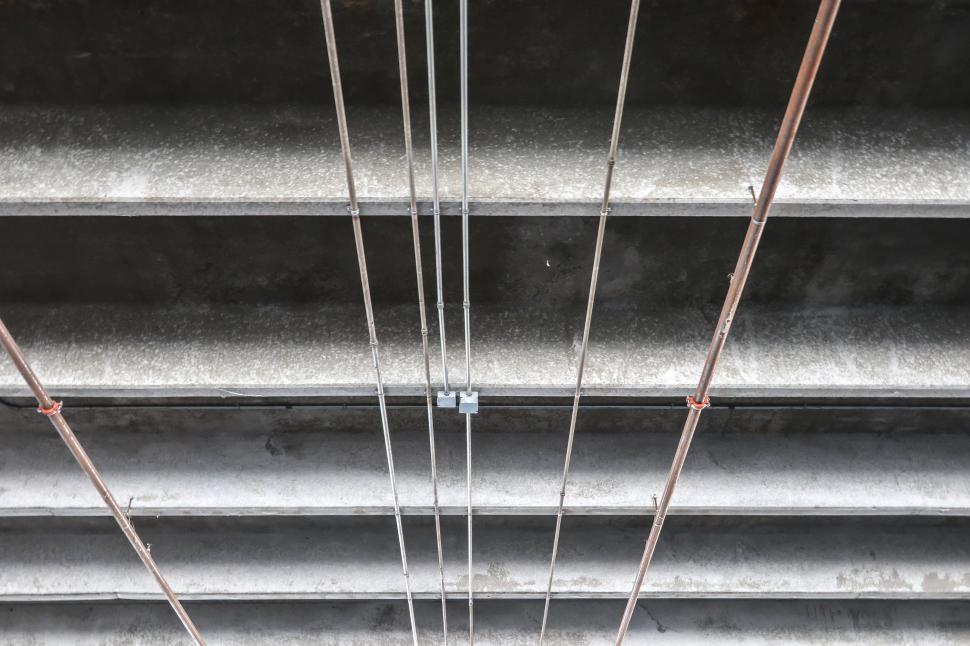 Free Stock Photo of Electrical Conduit on Concrete Beams Download