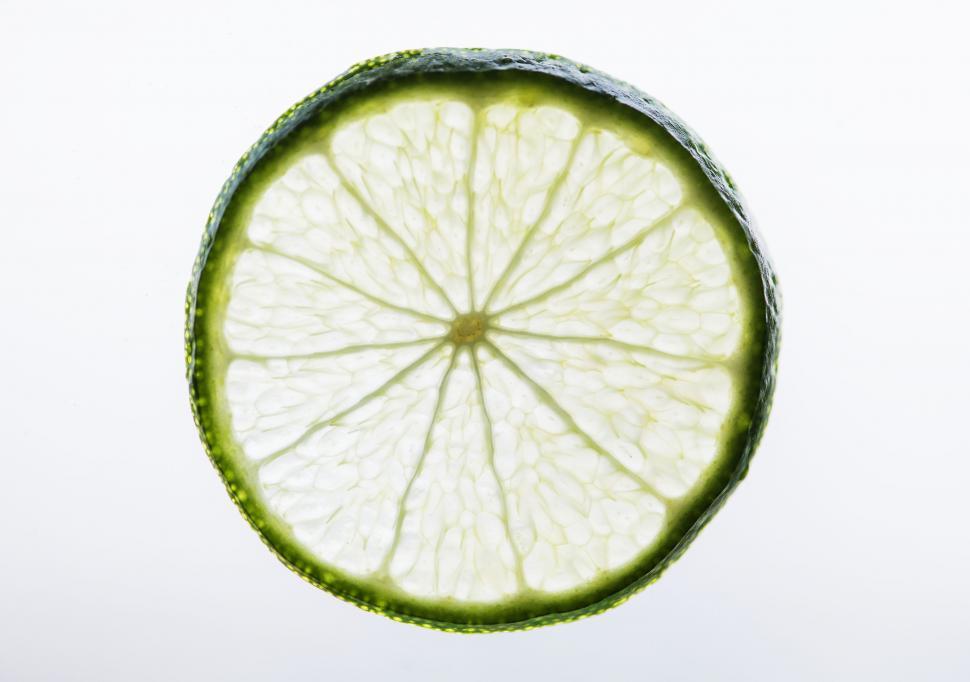 Free Image of Back illuminated close up of a lime slice 
